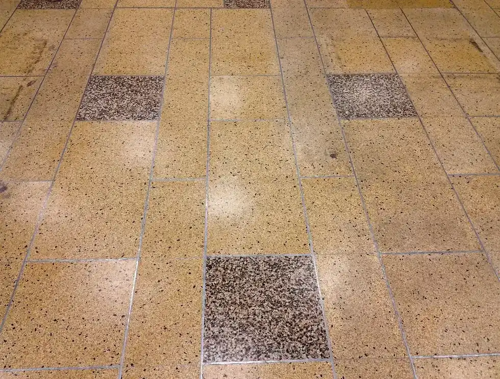 A commercial terrazzo tile floor with clean, crisp grout lines.